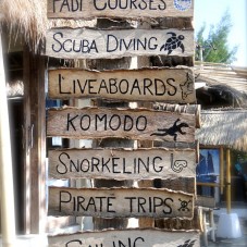 Snorkel, pirate trips, scuba, paid, sailing sign
