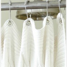 A DIY shower curtain from an Ikea Throw Blanket. Learn how on lynneknowlton.com